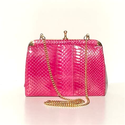 Pink Snakeskin Clutch Bag .